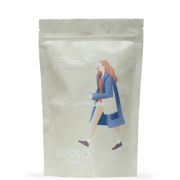 A Bag of Rosso Coffee the Commuter blend, a medium roast specialty coffee with notes of caramel, hazelnut and berry notes and a sweet dark chocolate finish.
